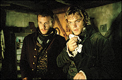 Ledger (left) and Damon as Gilliam's charlatan brothers.