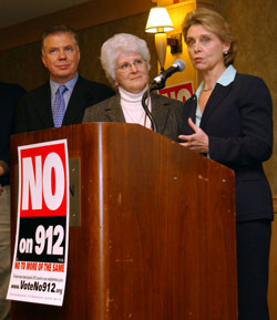 From right, Gov. Christine Gregoire congratulates transportation leaders Sen. Mary Margaret Haugen, D-Camano Island, and Rep. Ed Murray, D-Seattle, and others on election night. All were key to passing the gas tax increase this year—and defending it against Initiative 912.