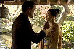 Watanabe inspects the merchandise (Zhang).