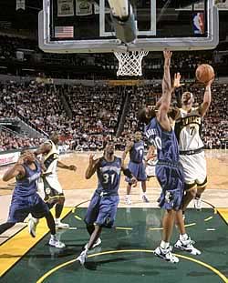The dance at KeyArena, as performed March 10 by the Seattle SuperSonics and the Minnesota Timberwolves. That's small forward Rashard Lewis with the ball.