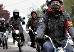 No respect from the cars: Kevin Barrans (right), with members of the Mosquito Fleet, a local chapter of the nationwide Moped Army.