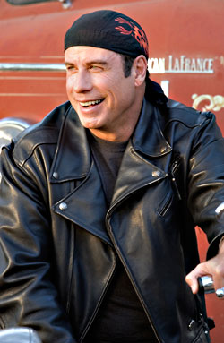 Travolta: "Does this tight leather bondage outfit make me look gay?"