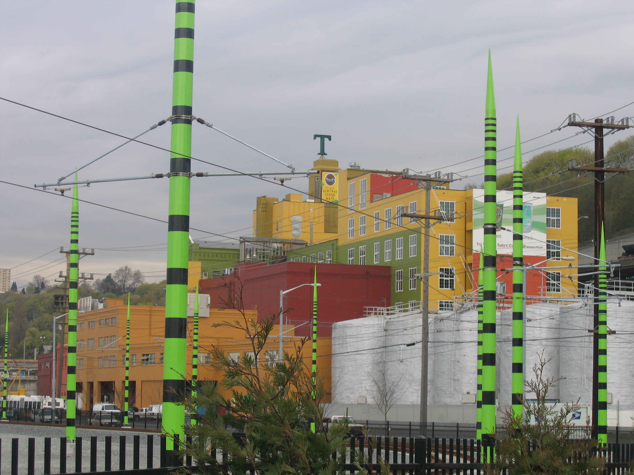 The most colorful white elephant in Seattle: the ArtsBrewery complex viewed through Sound Transit's SoDo pylons.