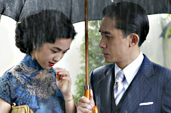 Wei plays the seducer with Leung.