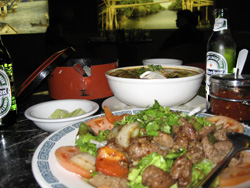 Shaking beef, sour catfish soup, and the omnipresent Heineken.