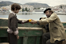 Serbedzija saves Robbie Kay (as young Jakob) from Holocaust horror in Fugitive Pieces.