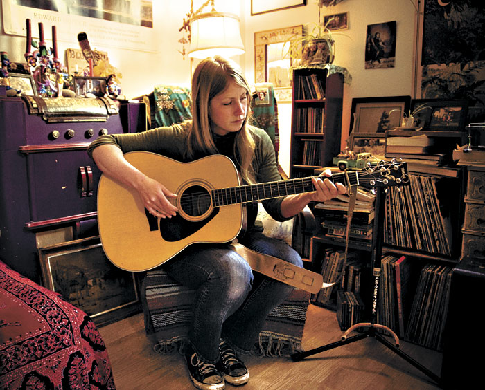 Muth taught herself guitar in high school.
