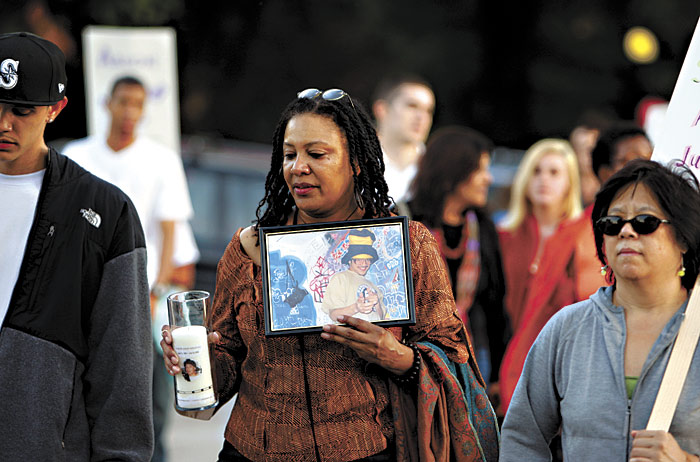 At a Sept. 10 vigil, Debra Sullivan and others marched down Broadway.