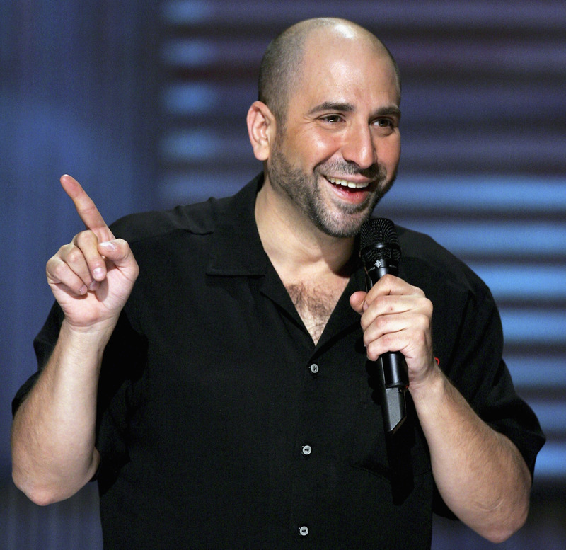 LAS VEGAS - JULY 03:  Comedian Dave Attell performs at the House of Blues inside the Mandalay Bay Resort & Casino July 3, 2005 in Las Vegas, Nevada. Comedy Central is shooting the television network's first original stand-up film, "Dave Attell's Insomniac Tour," featuring Attell and fellow comedians Greg Giraldo, Dane Cook and Sean Rouse.  (Photo by Ethan Miller/Getty Images for Comedy Central)
