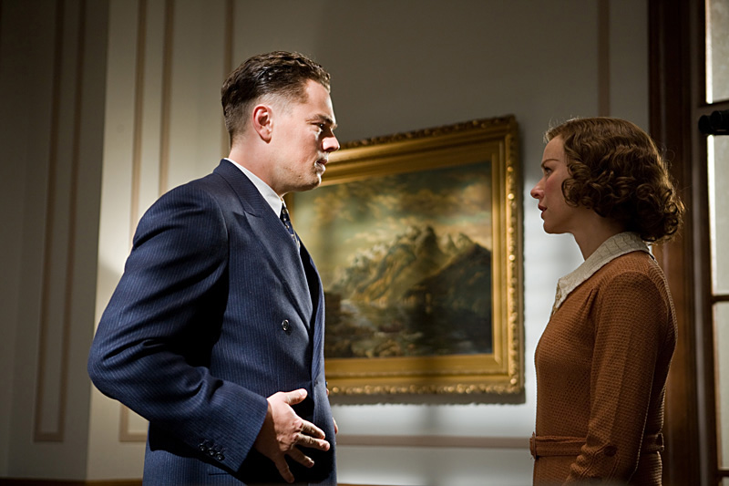 The overbearing boss (DiCaprio) ignores his sensible secretary (Naomi Watts).