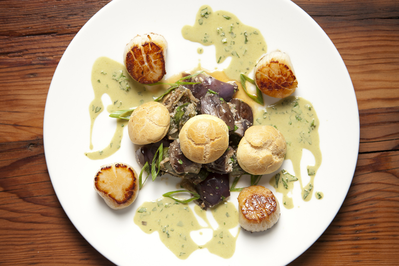 If there's one dish that demonstrates owner Kent Chappelle success, it's the Alaskan weathervane scallops.The composed plate's Asian stylings are echoed by split baby eggplants, airy naan puffs and a spray of macadamia nuts.