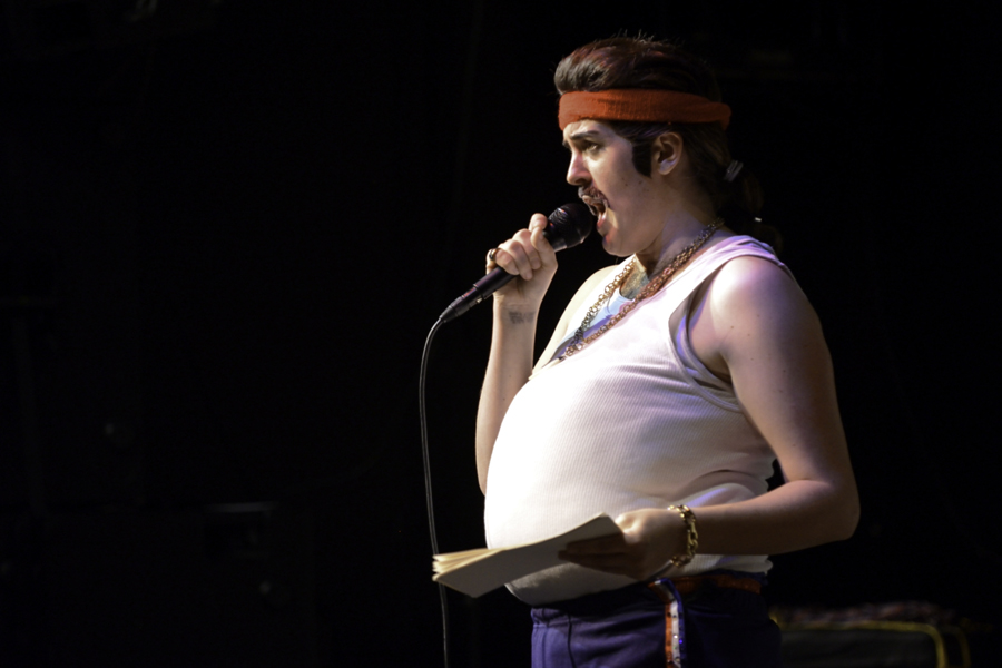 Host Ernie Von Schmaltz strips off another layer