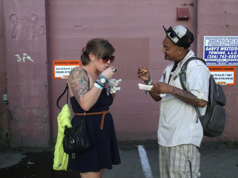 Nemencio and Chelsea from Seattle are here for Aesop Rock and pork thataE™s been smoked for 10 hours from Off the Rez.