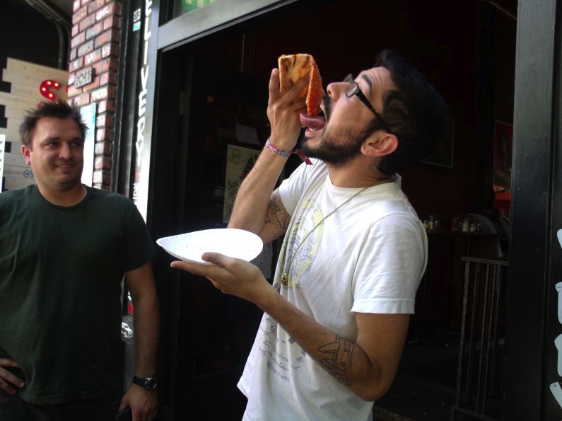 Tyler from Seattle digs Fly Moon Royalty and gets cheesy with Big Mario's.