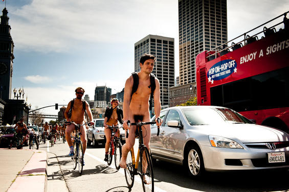 One part critical mass and one part nudist expression, the World Naked