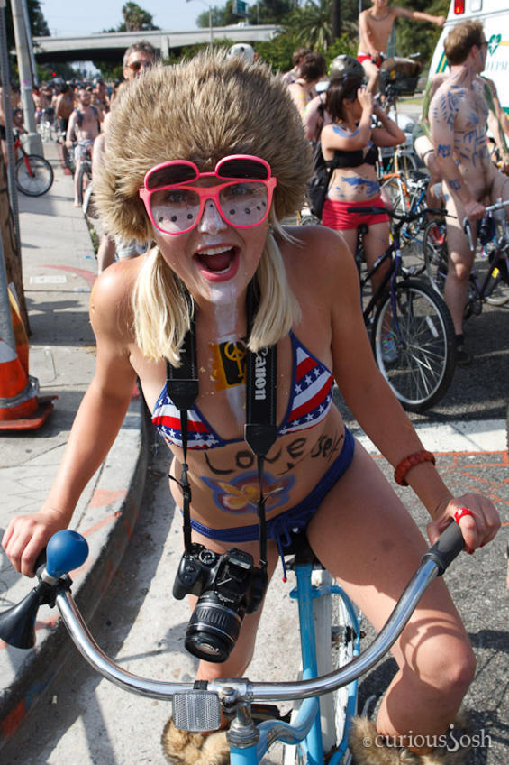 One part critical mass and one part nudist expression, the World Naked