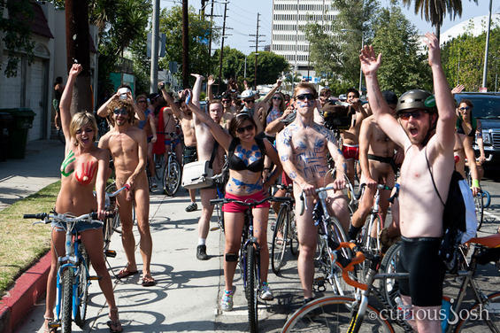 One part critical mass and one part nudist expression, the World Naked