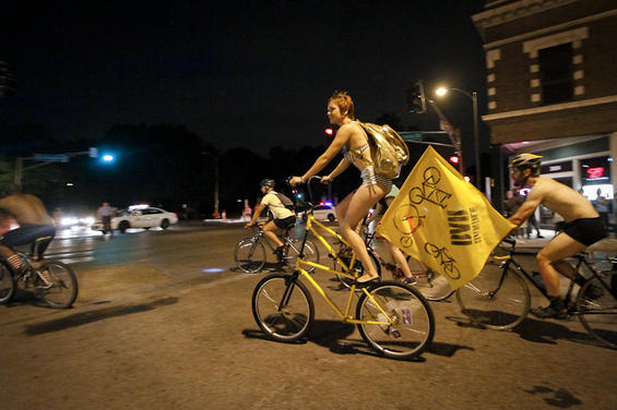 One part critical mass and one part nudist expression, the World Naked