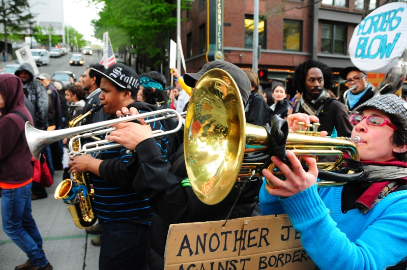 Participants in the annual May Day march for social justice started in