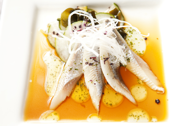 Local herring usuzukuri (sashimi) with ponzu and shiso oil.
