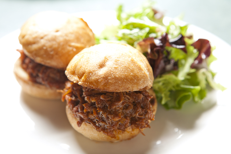 Currently, the meatiest starter at the Alexis is a pair of pulled pork sliders slathered with a brown sugared sauce and served on firm dinner rolls.
