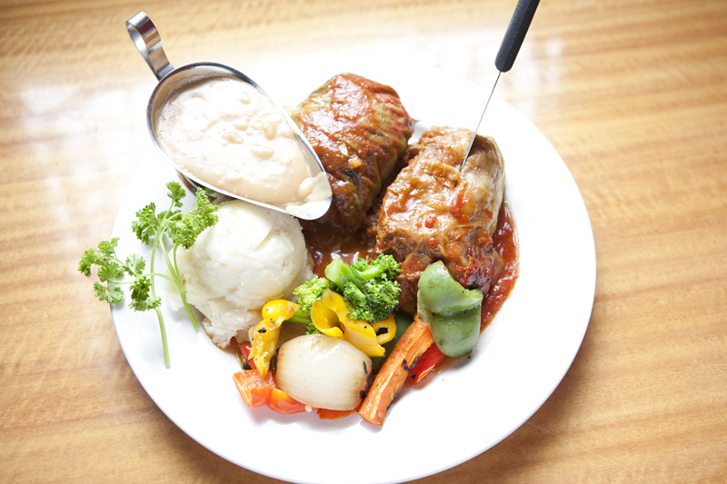 Sweet, tomato-drenched cabbage rolls, bloated with ground beef,were excellent.