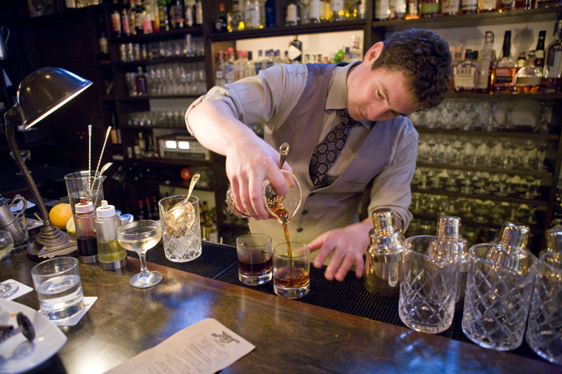 Bartender Jared Scar making a Canon cocktail.