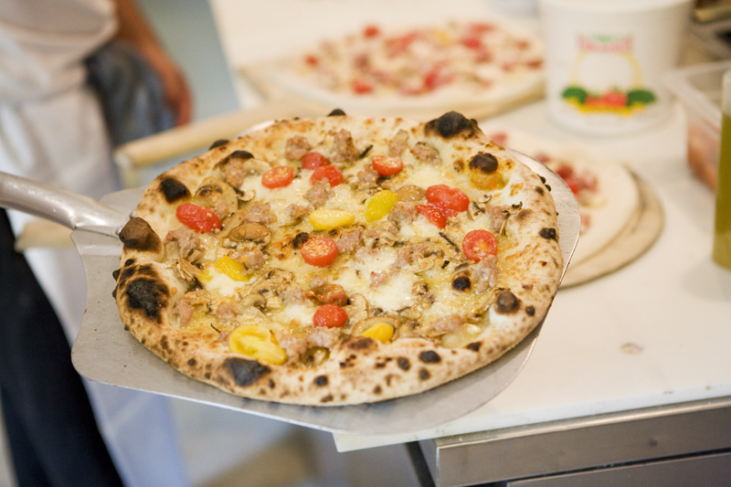 Funghi:Crimini mushrooms, cherry tomatoes, house made sausage, pecorino and fontina.