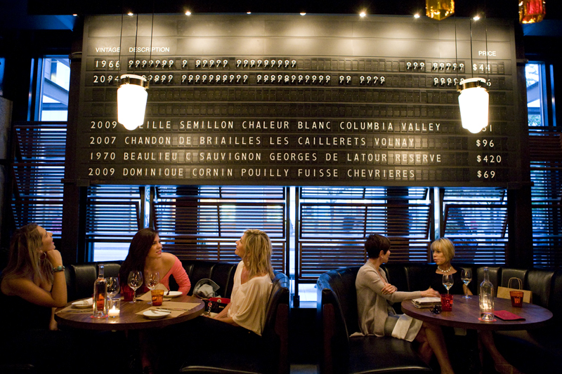Diners wait in anticipation as the infamous flip board works its magic.