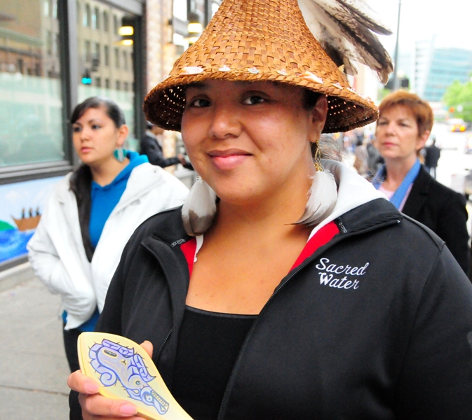 Jessi 'Old Coyote' performs with Sacred Water.