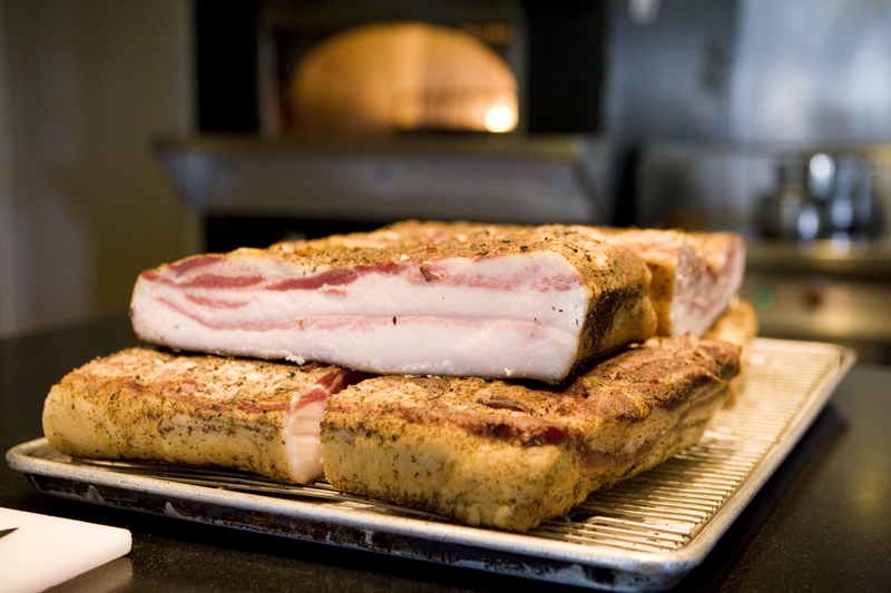 Piles of plump pancetta.