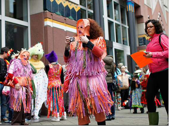 Nick Cave and his soundsuits paraded downtown for Cinco De Mayo this year. Photo by Mohini Patel Glanz