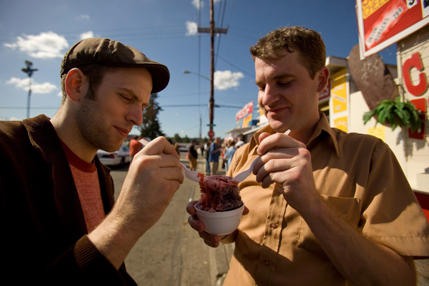 Garrett and Tony split some shaved ice.