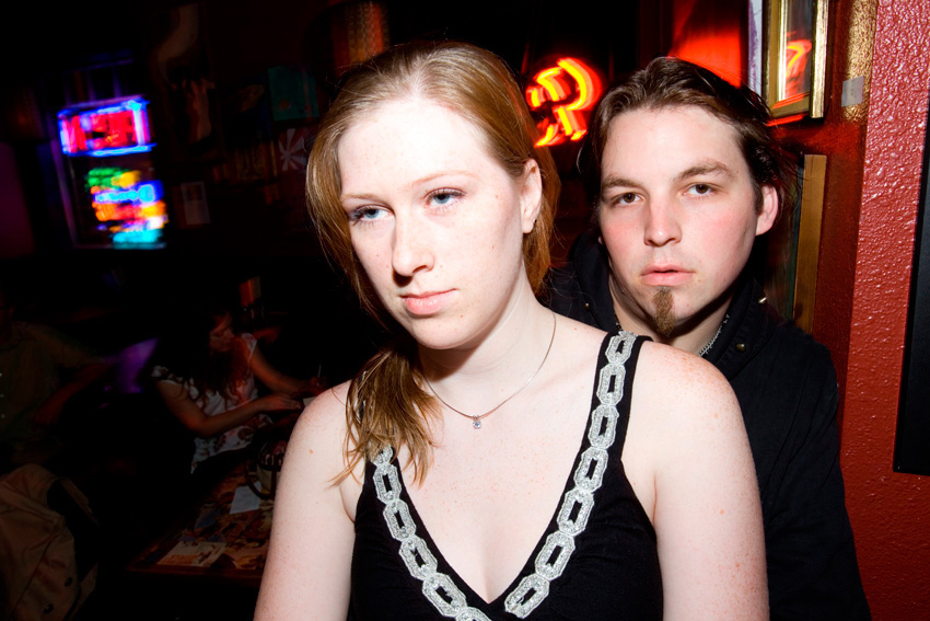 Danica Smith and Xak Reeder watch Sirens Sister perform