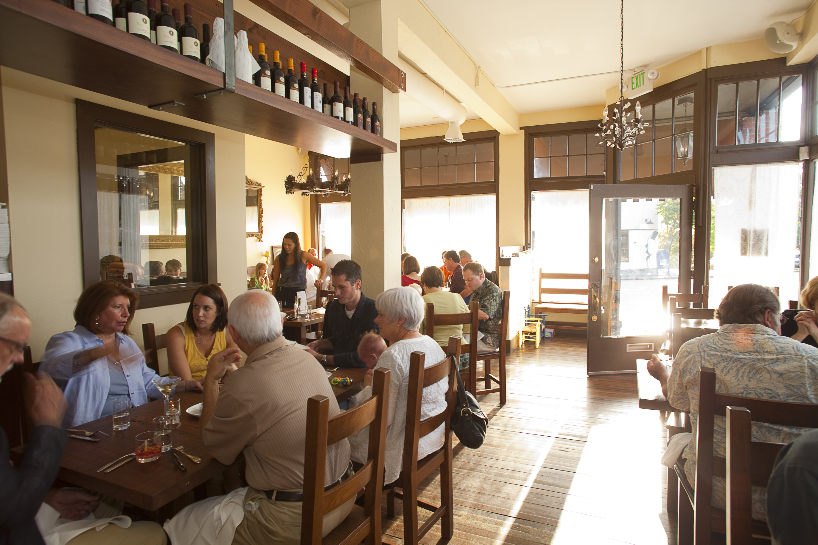 The strong, square lines of its chairs and tables--solid enough to withstand a barroom brawl or a swashbuckler's fight--echo Branzino and Cafe Juanita, while the Byronic chandeliers are reminiscent of Barolo and Via Tribunali and the lace curtains on its windows must have come from the same nonna who tatted them for Spinasse in Capitol Hill.