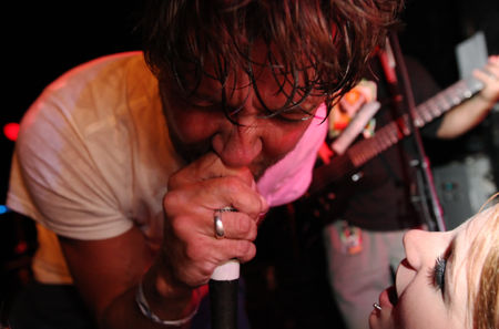 Last Night: Authority Zero and The Architects at El Corazon: Authority Zero lead singer Jason DeVore sings during the bandaE™s set on Friday night. Shooting photos from the front of the mosh pit aE” hard, but completely worthwhile.