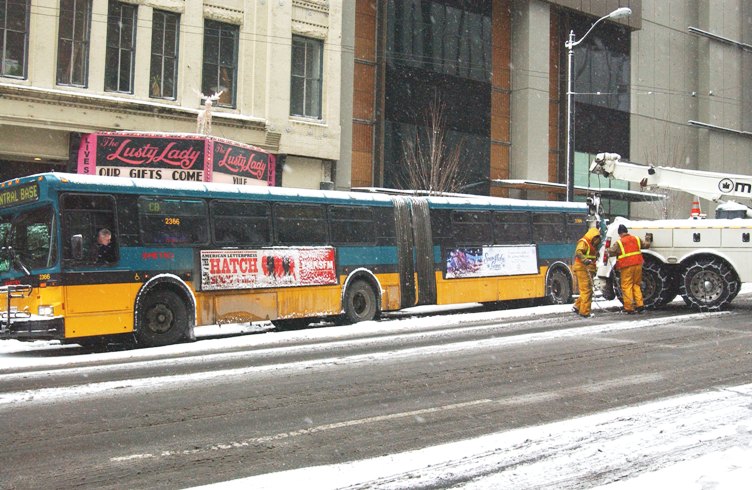 Push harder Metro crews relieve the Lusty Lady of bus pressure.
