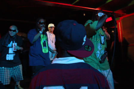 Spaceman looks on as Jay Barz and his crew perform.