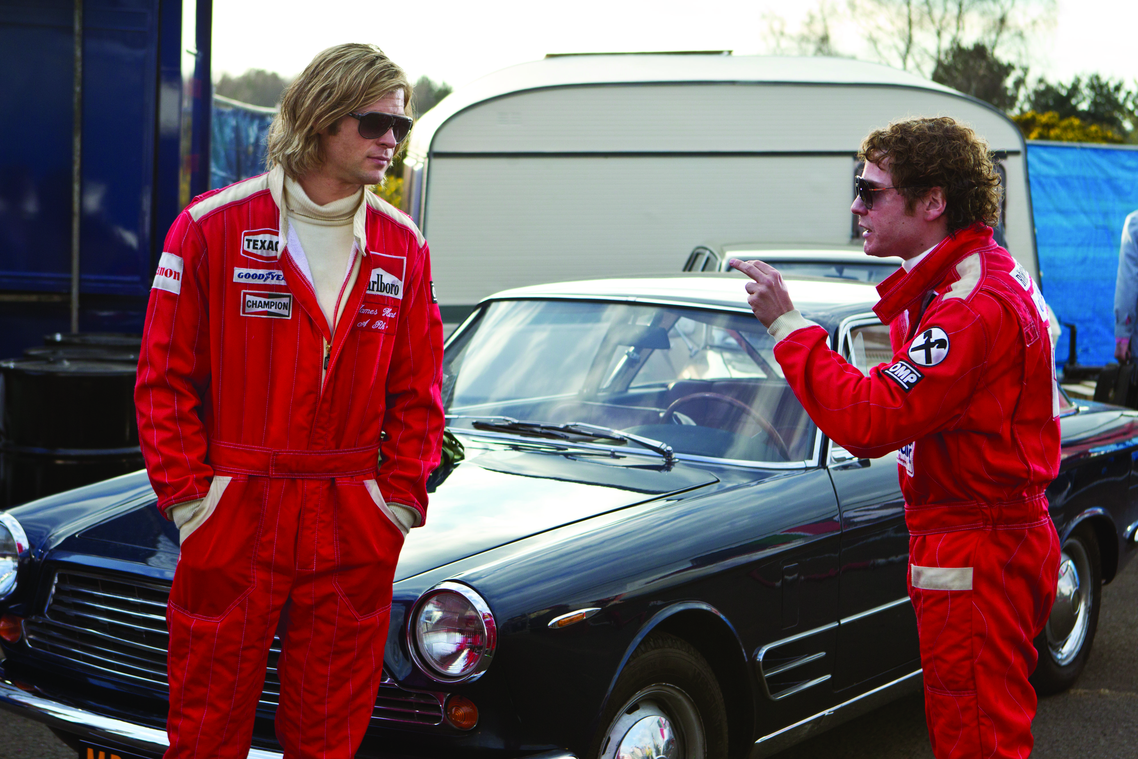 Hemsworth (left) and Bruhl as dueling drivers.