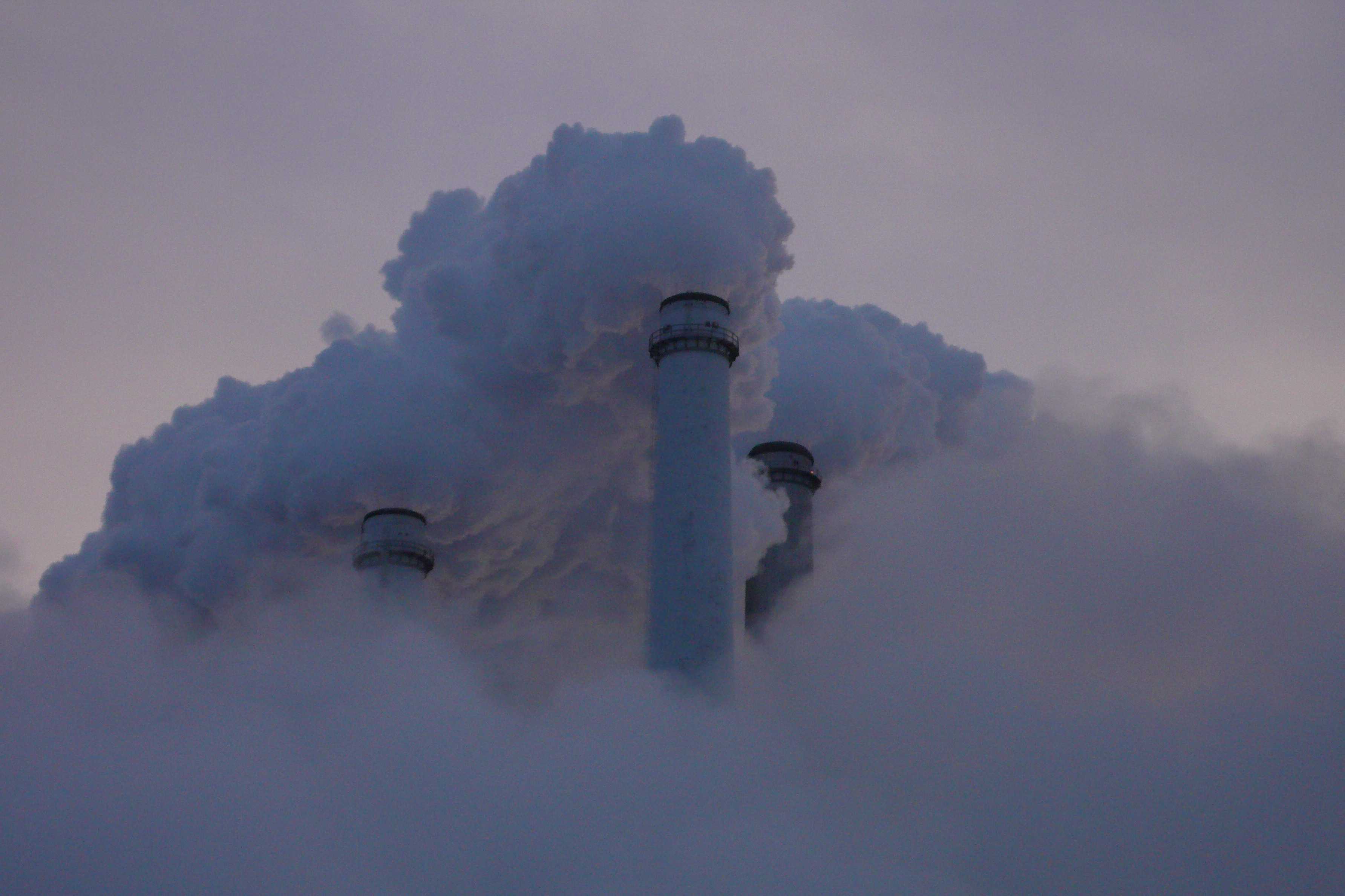 Steam rises from one of the coal-fired power plants in Colstrip, Montana. Puget Sound Energy owns the largest stake in the plant. Photo courtesy of Anne Hedges, Montana Enviornmental Information Center.