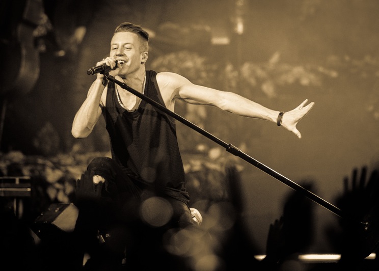 Macklemore performs to a sold out Key Arena in December 2013. Photo by John Lill