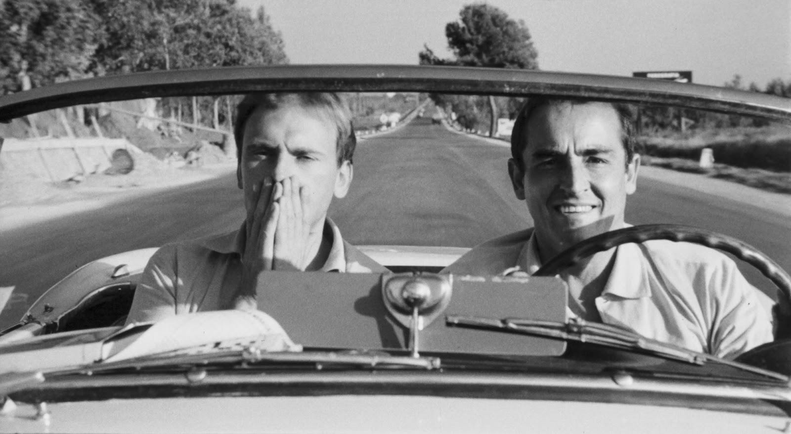Bruno (Gassman, driving) tells Roberto (Trintignant), “That's what I like—no plans!”Janus/Criterion