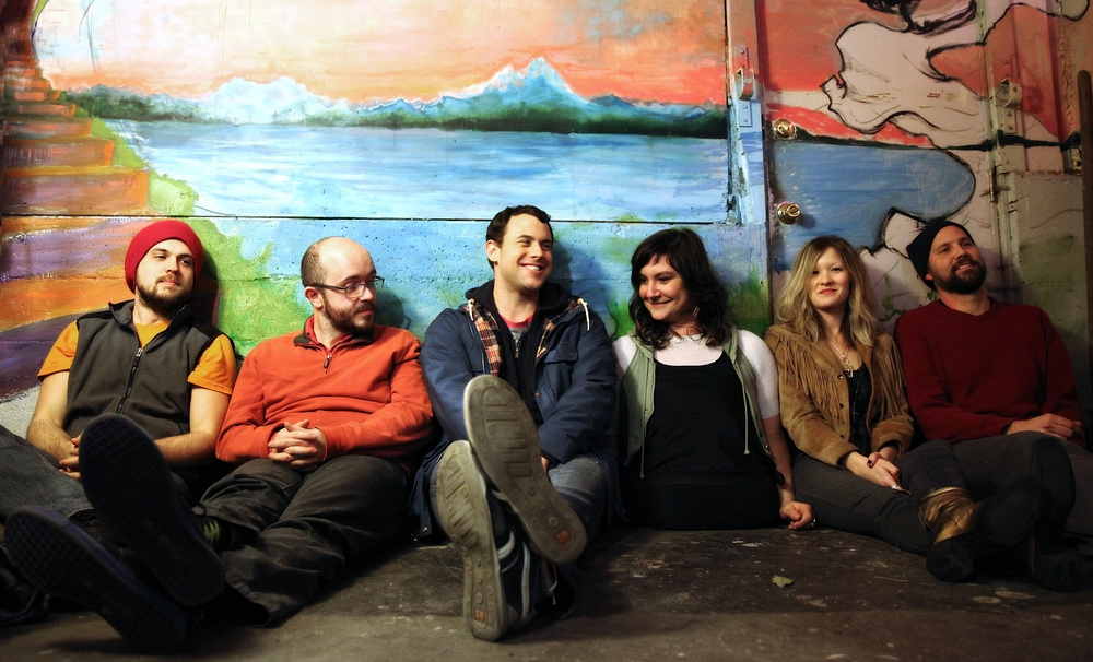 Mindie Lind (fourth from left) and her band, Inly.