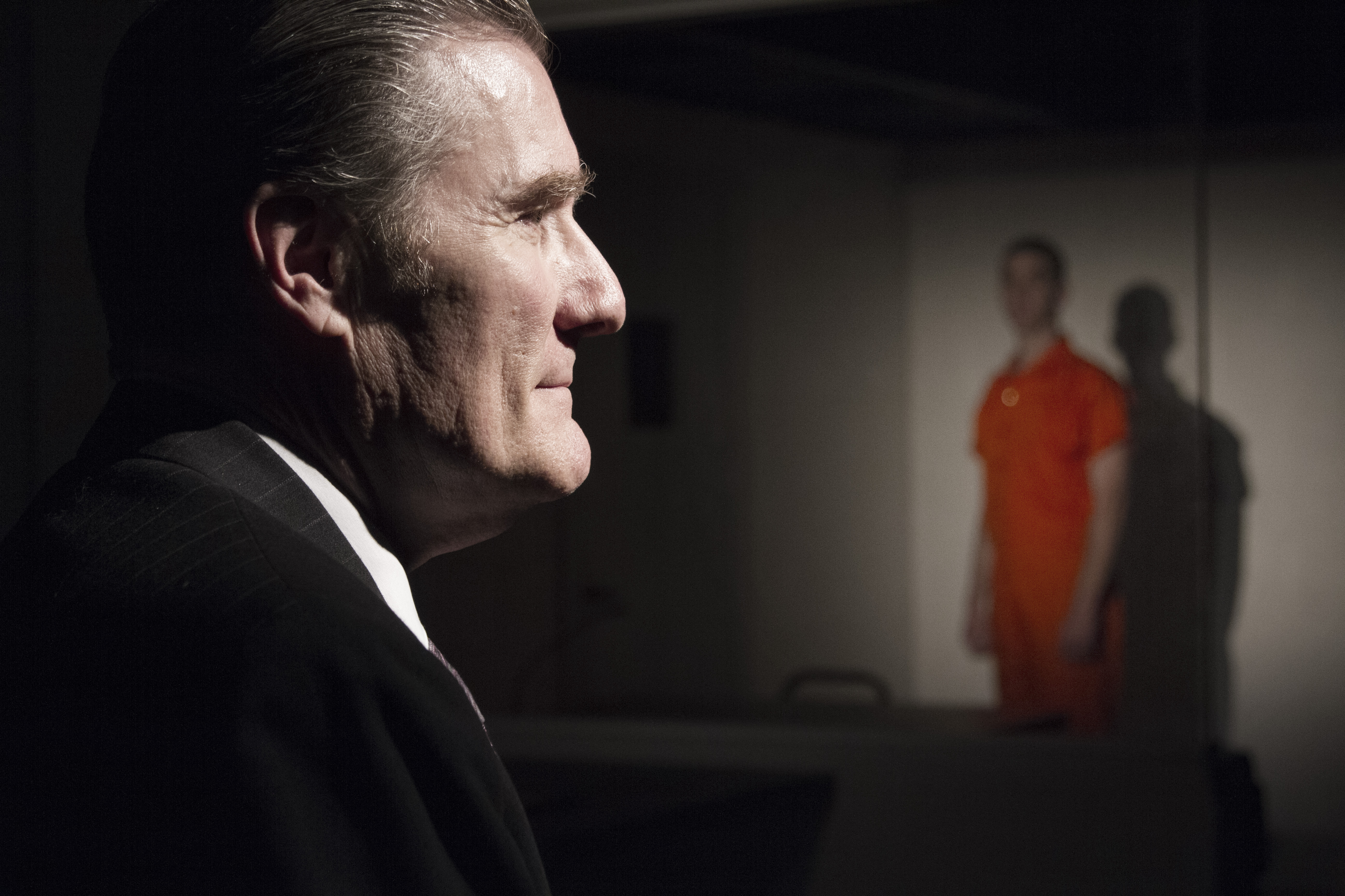 Newkirk's interviewer in foreground; Bergin's prisoner to the rear.Ian Johnston