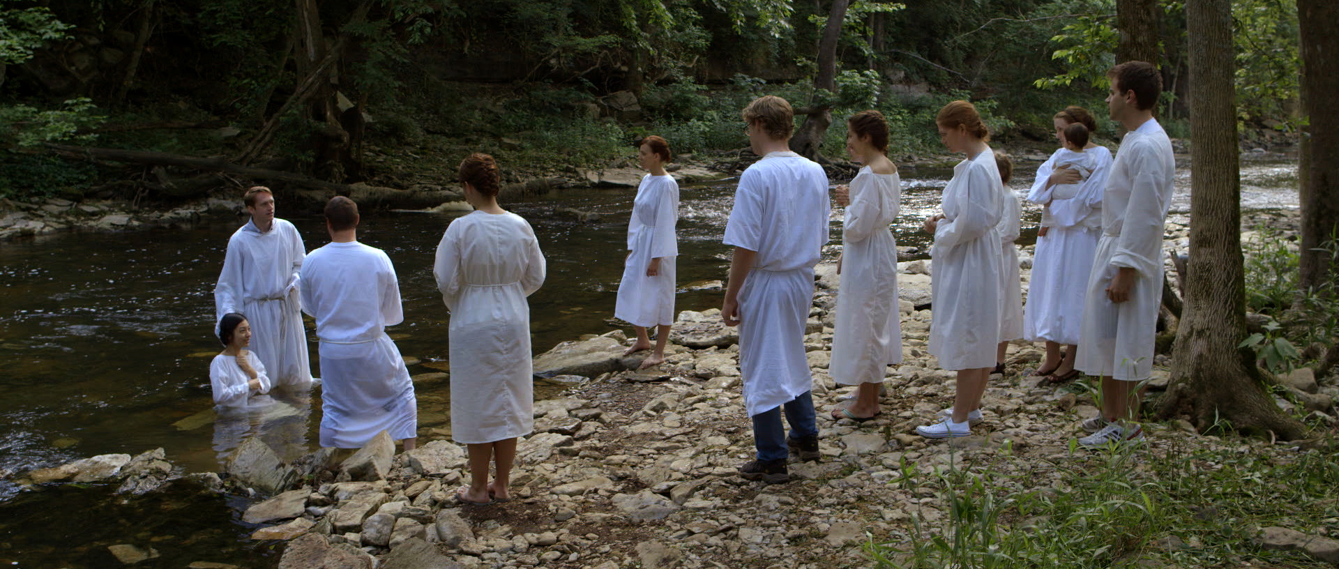 The cult congregants gather for a baptism.Cinema Purgatorio