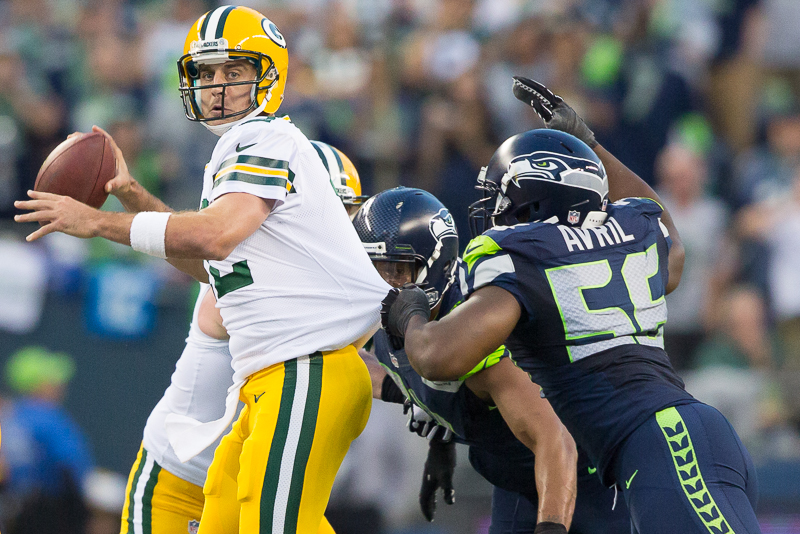 Defensive end Cliff Avril, who kept Rodgers running.