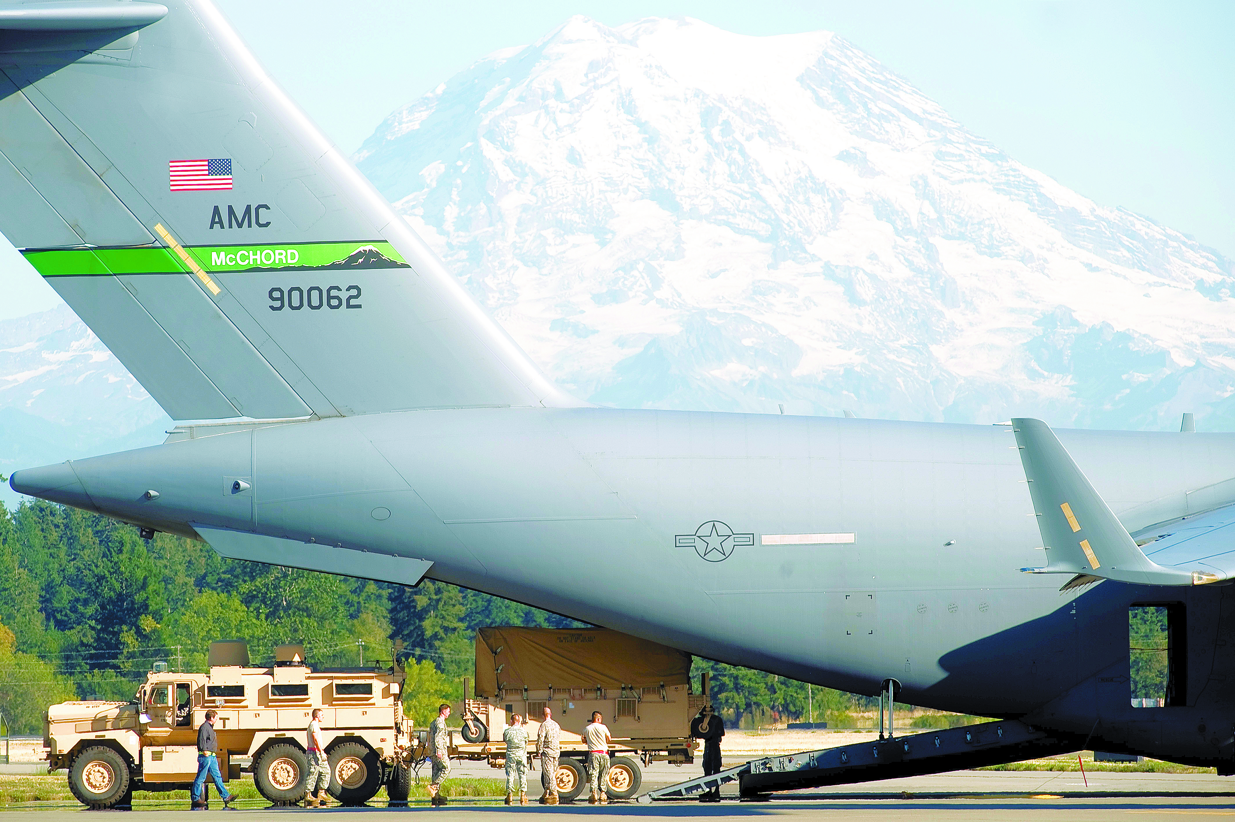 Life during wartime: A C-17 is loaded at JBLM in 2011.