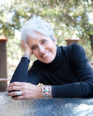 Like an old familiar friend, Joan Baez appeared on stage Friday evening