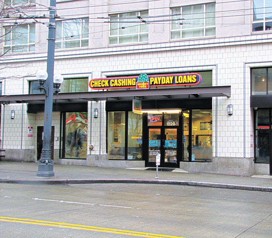 Under a strict lending law, the number of payday loan outlets, like this one in downtown Seattle, has dwindled. Photo by Jose Trujillo.
