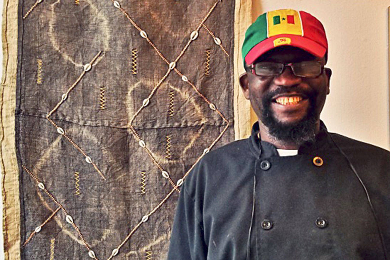 “I make traditional food,” says Mamadou Diakhate, who has owned La Teranga for 10 years. Photo by Kellen Burden
